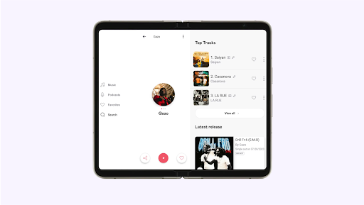 A foldable phone displaying the Deezer feed with top tracks and latest song releases.