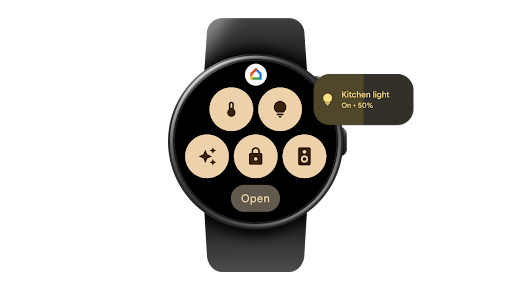 Swiping left or right on a Wear OS smartwatch to access the Google Home favourites tile, then tapping into the light icon to increase the kitchen light from 50% to 100%.