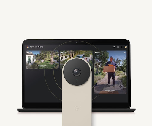 A Nest Doorbell in front of a computer showing live footage from the Front Door Cam