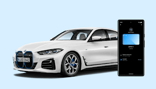 Un BMW i4 y un tel�fono Android con una llave digital para autom�viles.