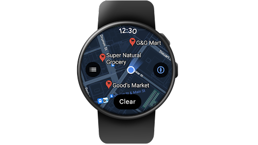 Algu�m a usar o Google Maps para Wear OS para localizar uma mercearia e ver as respetivas informa��es num smartwatch.