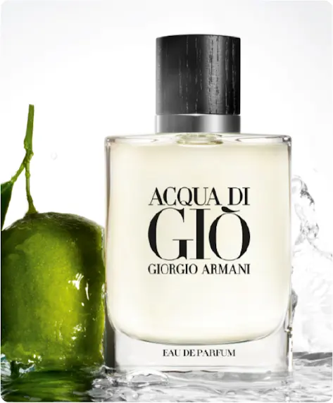 Una bottiglia di profumo Acqua Di Gio raffigurata accanto a un lime.