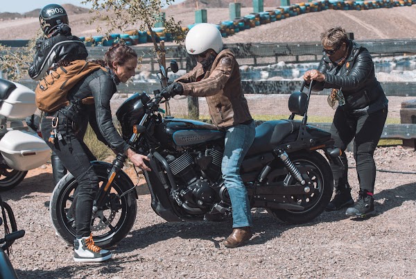 Women motorcyclists interacting