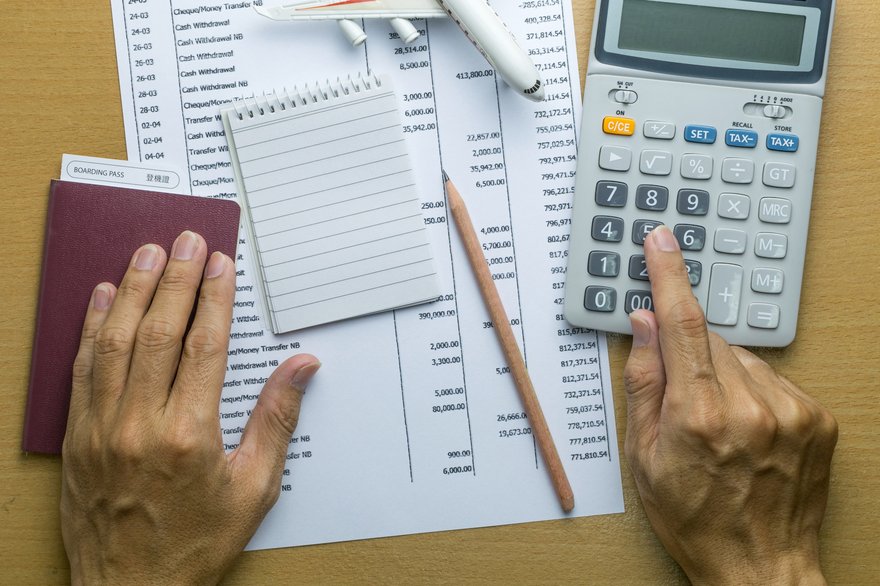 Documents and a calculator.