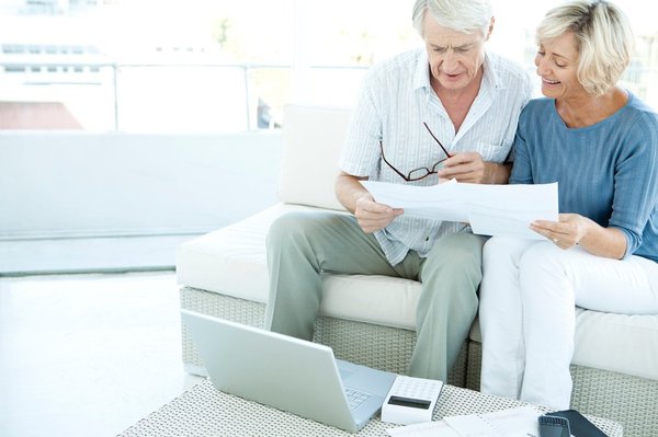 Older couple looking at documents.