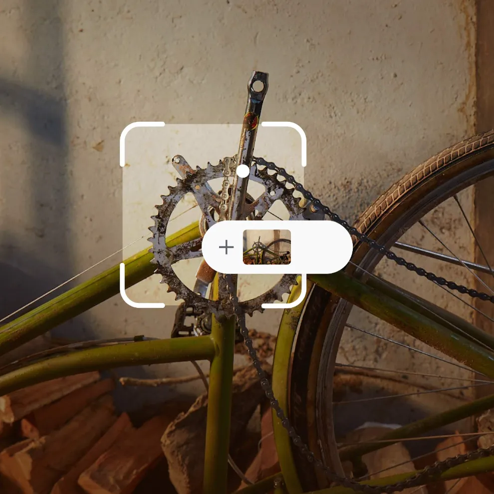 Image of broken rusty bike part with Google Lens framing around it