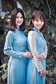 Two women wearing blue Áo dài, February 2017