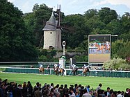 The windmill at the Hippodrome de Longchamp is a vestige of the old Abbey of Longchamp, destroyed after the French Revolution.