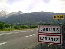 Bilingual French/B�arnais sign at the entrance of Laruns.