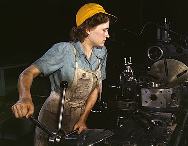 Turret lathe operator at United States home front during World War II, by Howard R. Hollem