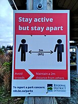 A sign encouraging social distancing in Nanaimo, British Columbia