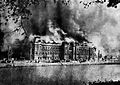 Image 46The Metropolitan Police Department burning at Marunouchi, near Hibiya Park during the 1923 earthquake (from History of Tokyo)