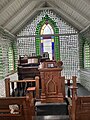 Small chapel with walls made of glass bottles