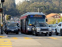 A bus on a busy multi-lane road