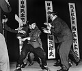 Image 10Otoya Yamaguchi preparing to stab Inejiro Asanuma a second time (from History of Tokyo)