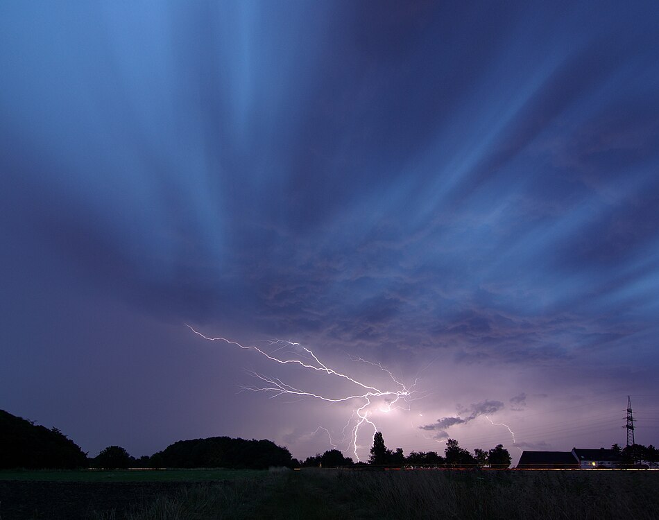 The background of this page, a thunderstorm in Germany