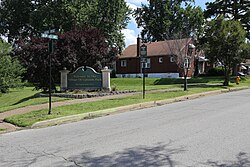 Welcome sign for Uplands Park, Missouri, July 2016