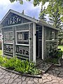 Small house with walls made of glass bottles