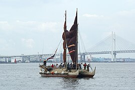 Hōkūle‘a arrives in Yokohama Bay, 2007; Yokohama Bay Bridge in background