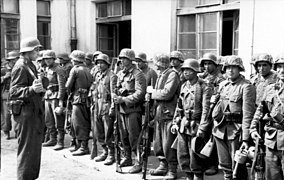 Well-armed soldiers of the "Dönmec" battalion, an Azerbaijani SS volunteer formation during the Warsaw Uprising