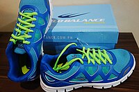 World Balance Hyper Track running shoes.