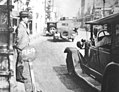 Image 43A Tokyo taxi driver indicating a fare of 50 Sen by holding up five fingers, in 1932 (from Transport in Greater Tokyo)