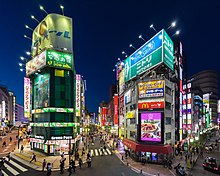 Buildings with colorful neon street signs at blue hour, Shinjuku, Tokyo