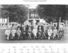 The Scientific Advisory Committee with Building 328 under construction in the background. Back row: Mr. Moerman, Mr. Dickinson, Mr. Carr, Mr. McNeilly, Mr. Shanks, Mr. Leeder. Middle row: Lt. Gillon, Mr. Lane, Mr. Reno, Mr. Hitchcock, Dr. Charters, Capt. Simon, Dr. Hodge, Mr. Beeman, Mr. Tolch, Mr. Gay, Lt. Steele. Front row: Mr. Kent, Prof. Urey, Prof. Rabi, Dr. Dryden, Dr. Lewis, Col. Zornig, Dr. Hull, Prof. von Karman, Prof. von Neumann, Prof. Russell, Dr. Dederick.