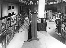 Army officials operating ENIAC at the Moore School of Electrical Engineering.