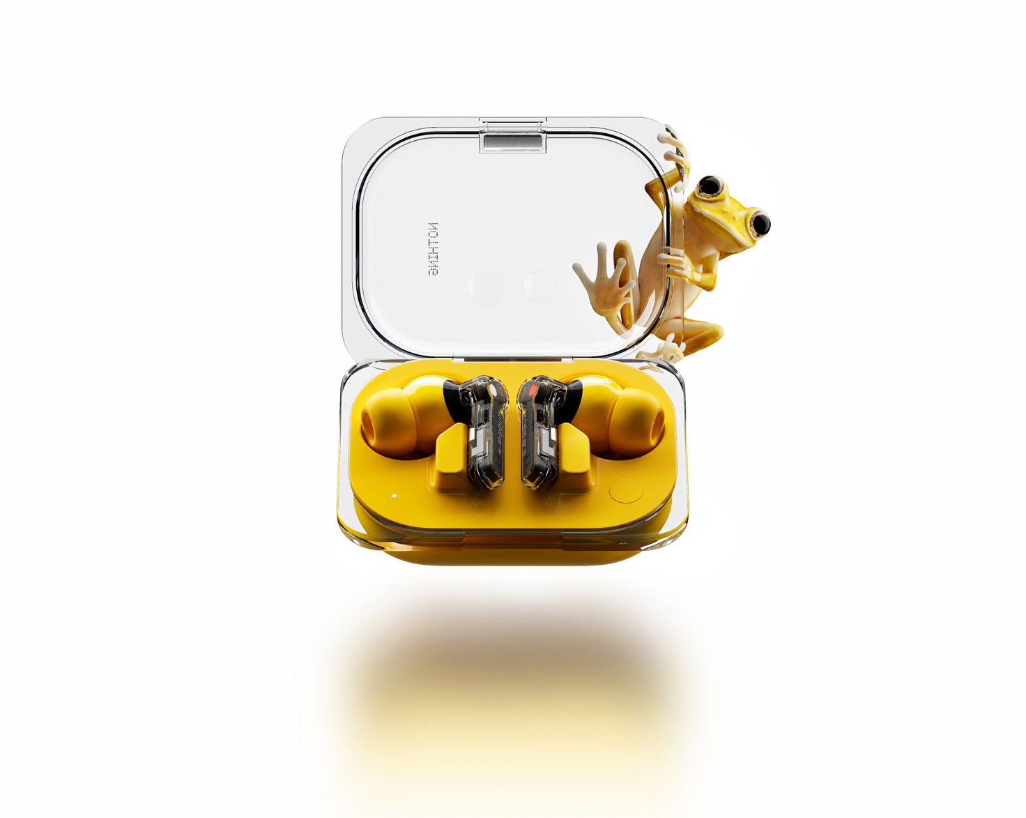 Nothing Ear (a) earbuds in a yellow case with a frog perched on top, highlighting playful design and functionality.