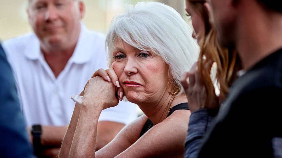 Mesa County Clerk and Colorado Republican candidate for secretary of state Tina Peters reacts to early election returns during a primary night watch party