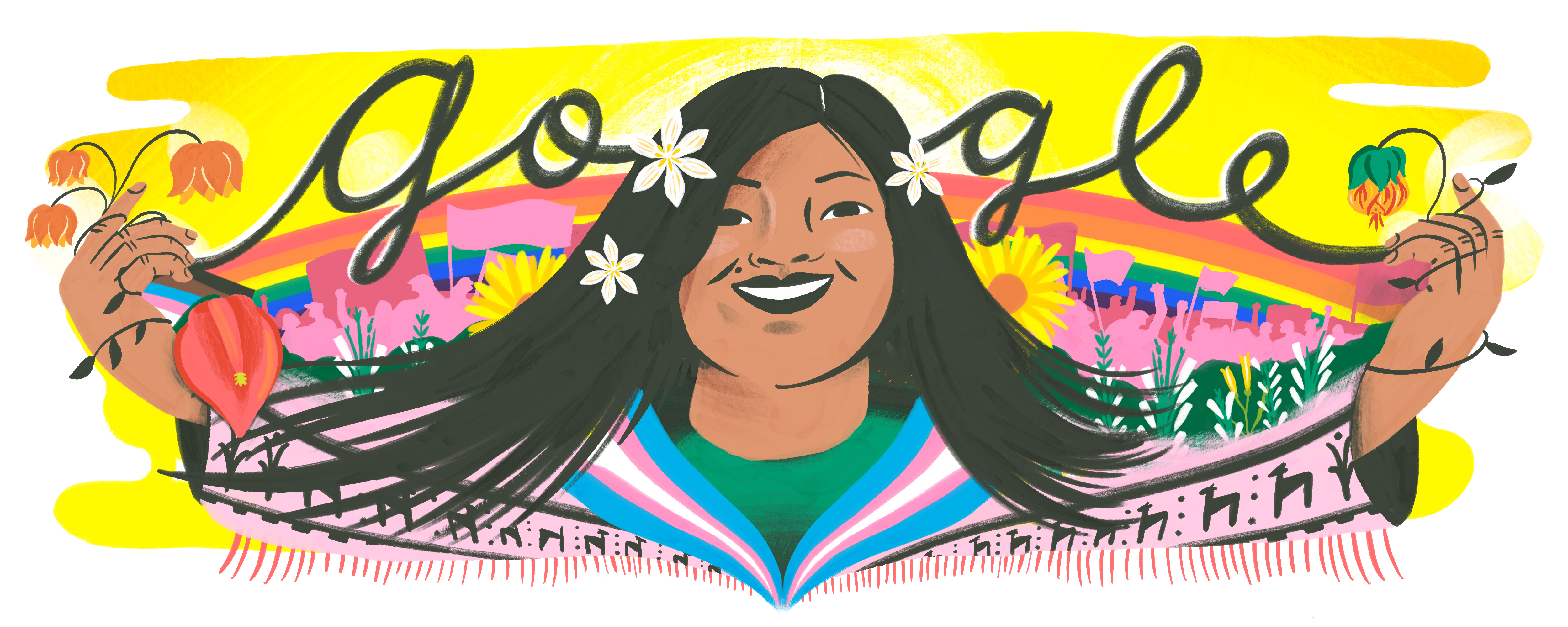 illustrated portrait of Diana Sacay�n from the chest up, with both of her arms extended out to the sides. She has long, striaght black hair, black eyes, and olive skin. She has a mole above her lip and is smiling with her teeth. She has white flowers in her hair and orange and red flowers in her hands. The Google logo is in black cursive letters behind her, sitting on top of a rainbow. There are more flowers and a pink silhouette of a crowd of people carrying banners behind her. She is wearing a green crew neck shirt and a pink jacket with an animal print, pink tassels all along the arm, and the collar is colored to look like the trans pride flag with light blue, pink, and white stripes.