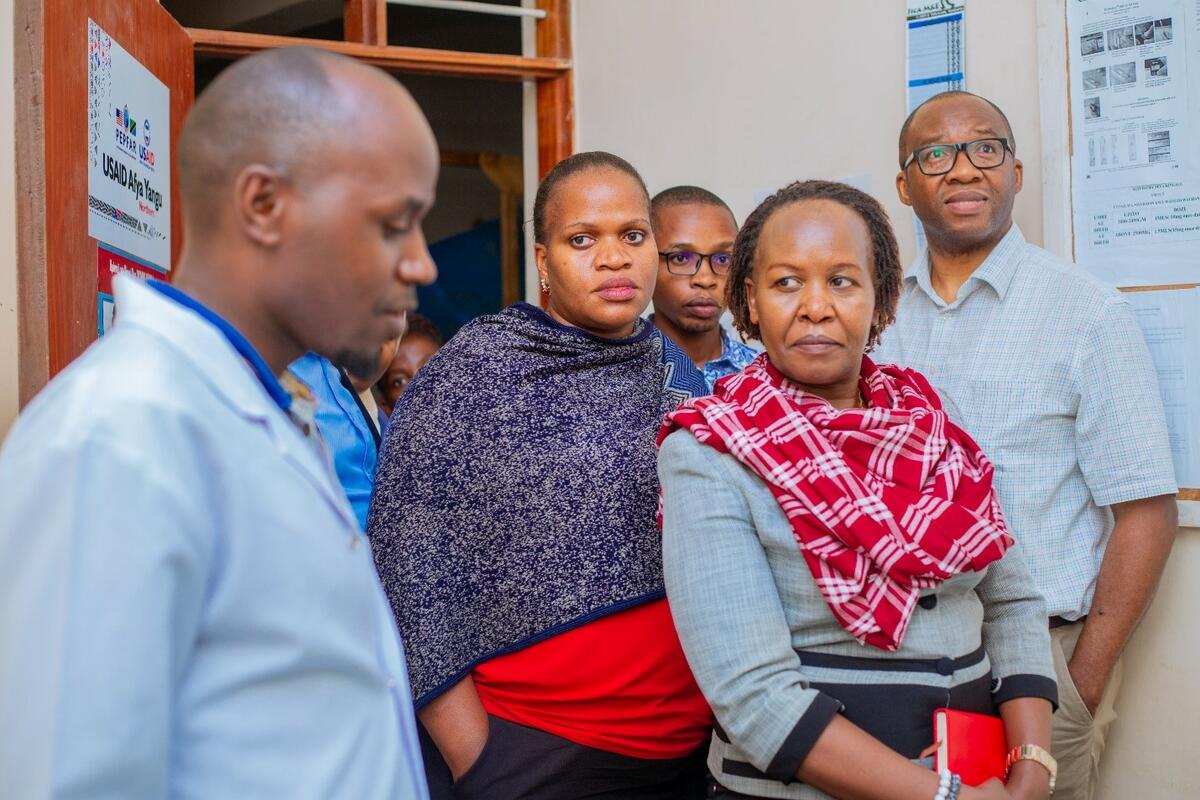 Baraka medical officer in charge (left) speaking of the remarkable transformation he has witnessed druing the project implementation by LSTM and UDOM. Photo credit UDOM