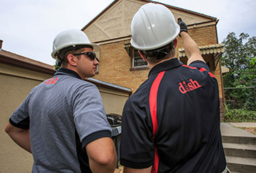 OnTech technicians working on customer's home