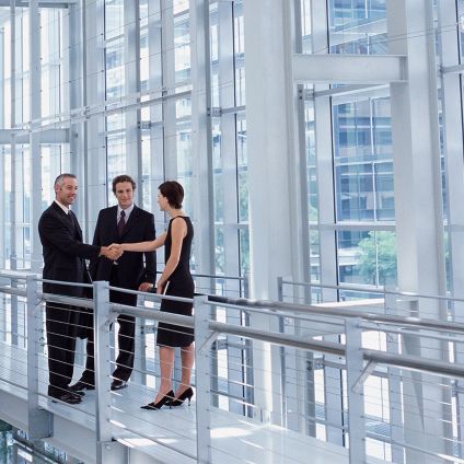 Three colleagues in the modern office