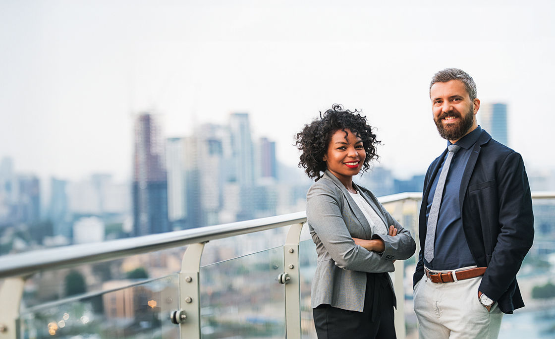  Two Colleagues with Sky View