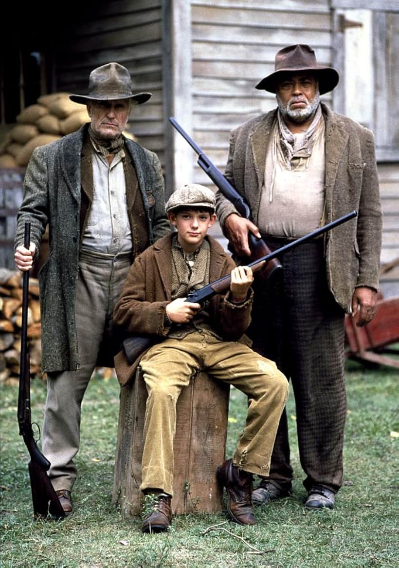 Robert Duvall, James Earl Jones, and Lukas Haas in Convicts (1991)