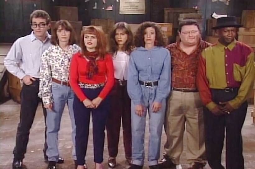 Jennifer Aniston, Wayne Knight, Julie Brown, Tom Kenny, Carol Rosenthal, James Stephens III, and Jill Talley in The Edge (1992)