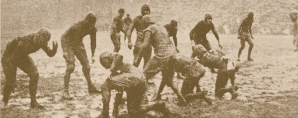 Muddy football field 1923