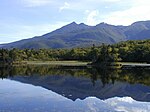 Mountains reflected in a lake.