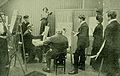 Christian Krohg (1852–1925), seated center, lecturing a class at Statens kunstakademi in Oslo