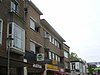 Winkelpand met bovenwoning