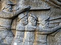 Detail aus dem 22 Meter lange Schlachtdenkmal vor dem Kapuziner Kloster in Dornach von 1945–48. Der Soldat, zweiter von rechts, trägt die gleiche Kopfbedeckung, Mütze wie Jakob Probst