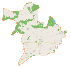 Mapa konturowa gminy Szydłów, blisko centrum na dole znajduje się punkt z opisem „Szydłów”