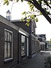 Woningblok met dienstwoningen, voormalig kantoor en werkplaats