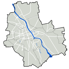 Mapa konturowa Warszawy, blisko centrum na lewo u góry znajduje się punkt z opisem „PL.2012+ Sp. z o.o.”