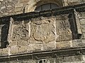 Emblemas de los Reyes Cat�licos en la fachada de la iglesia de Santiago, de Losar de la Vera (C�ceres), c. 1500.