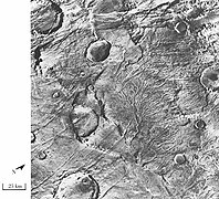 Les réseaux de canaux comme ceux situés dans le quadrangle de Thaumasia sont de solides preuves de l'existence d'ancienne pluie martienne.