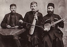 Ashugh Jivani (center) with instrumentalists