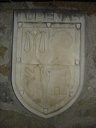 Blason de la ville sur la façade de la mairie.